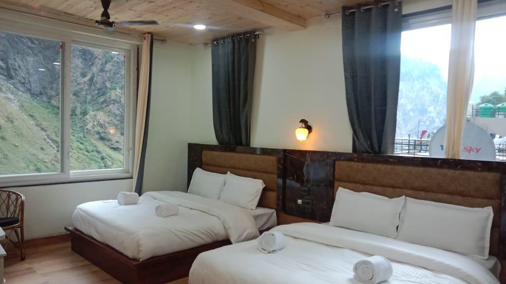Hotel room near Badrinath temple with mountain view