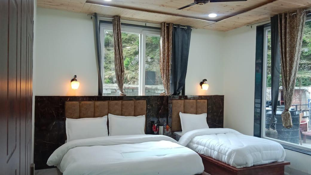 Hotel room near Badrinath temple with mountain view